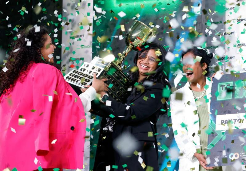 Startup Battlefield winner holding trophy at TechCrunch Disrupt 2022